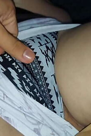 Cute stepsister sits on my legs while I watch TV, she spreads her legs and lets me touch her pussy, it'_s all wet